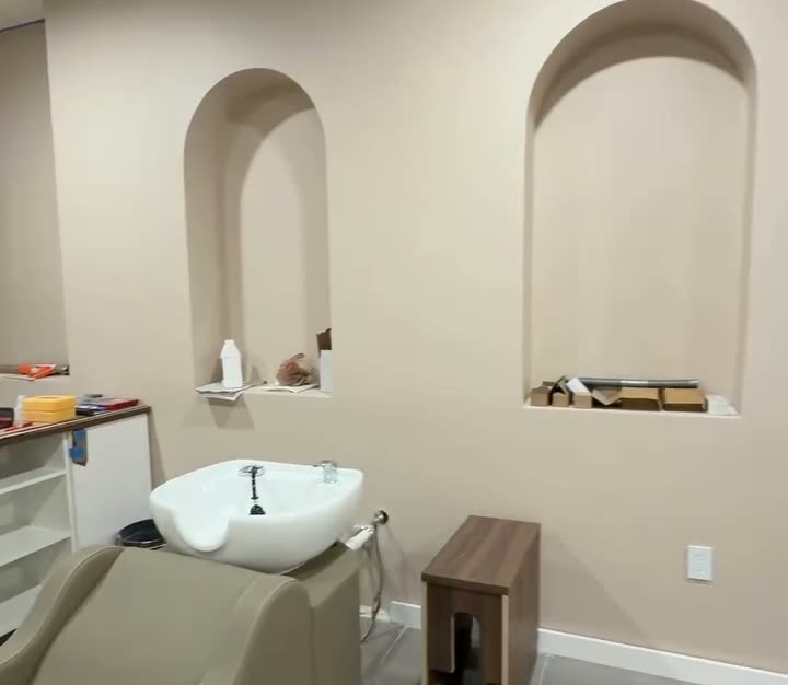 Arched treatment niches in the luxury spa built by CoreExec